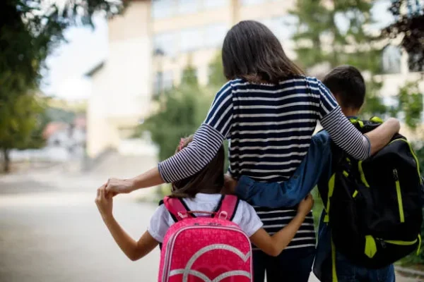 mother-taking-kids-to-school